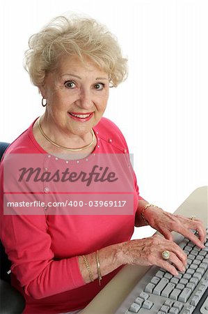 A beautiful senior woman using the computer.