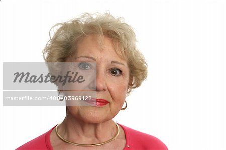 A beautiful senior woman with an expression of wisdom and kindness.  Isolated