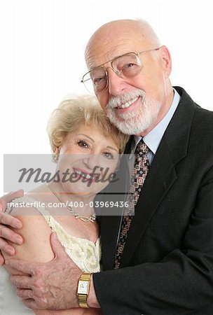 A handsome, successful senior couple dressed up for a special occasion.