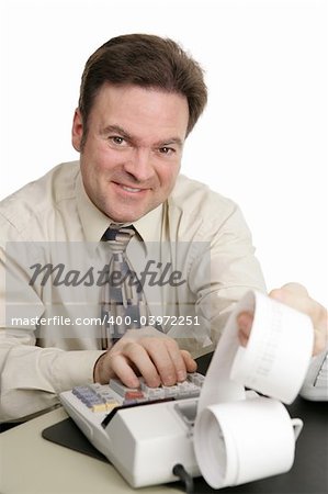 A friendly smiling accountant working on his adding machine.  Isolated on white.