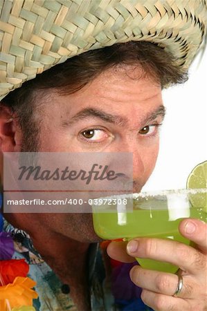 A handsome tourist sipping a margarita.