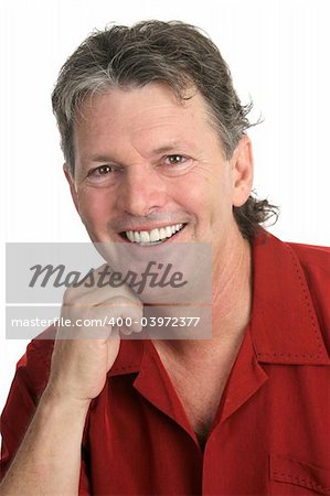 A casual, handsome, middle-aged man with a beautiful smile and perfect teeth.