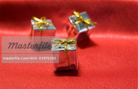 Silver gift on a red background