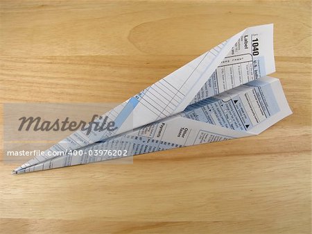 Tax form paper airplane