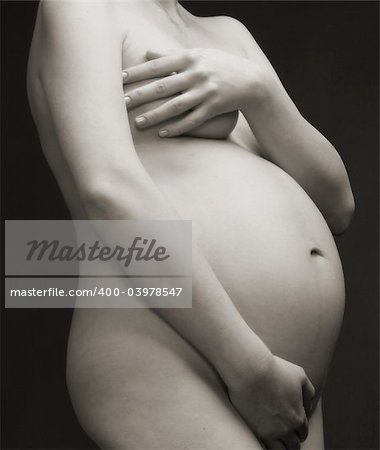 close up view of a pregnant woman's stomach