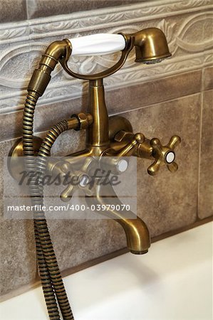 The beautiful bronze faucet in a bathroom