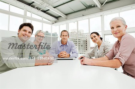 Five businesspeople meeting in office
