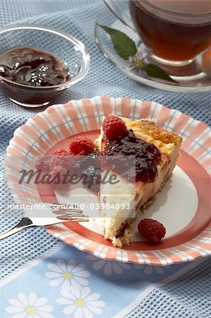 soft cheese pie with berry jam and raspberries