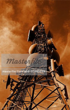 A communications tower in a dark sepia tone.