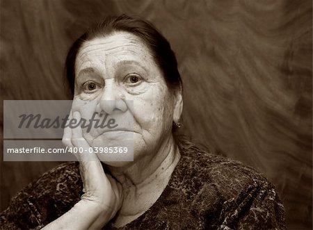 Sad grandmother close-up. Woman in her eighties.