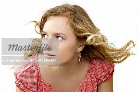 Beautiful girl with blown hair separate on white
