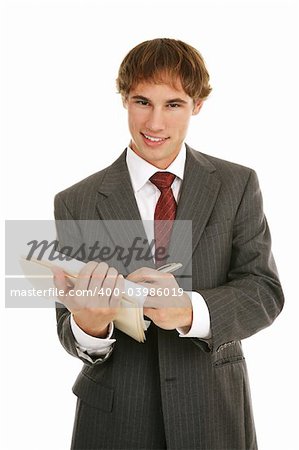 Handsome young businessman taking notes and looking up with a sexy expression.  Isolated on white.