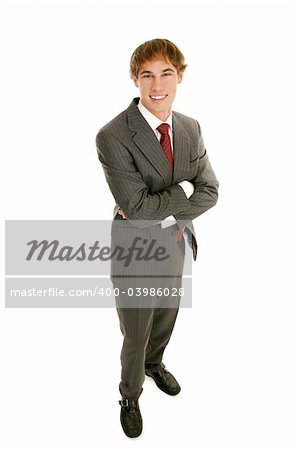 Handsome young businessman.  Full body view with arms crossed.  Isolated on white.