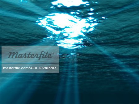 Underwater , sea surface with sunbeam shining through