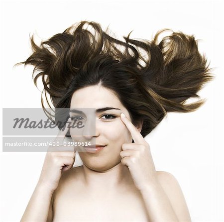 Young beautiful woman portrait isolated in a white background