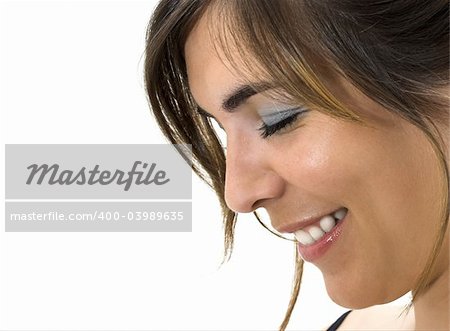 Beautiful young woman smiling with eyes closed