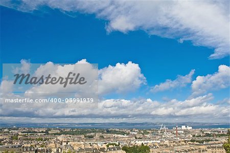 A view of Edinburgh under a cloudy sky from the Calton Hill