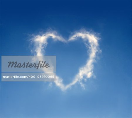 The cloud in the form of heart against a blue sky. To the Valentine's Day joke.