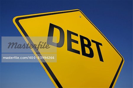 Debt Road Sign on a Deep Blue Sky Background.