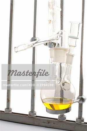 chemical equipment with yellow liquid in it