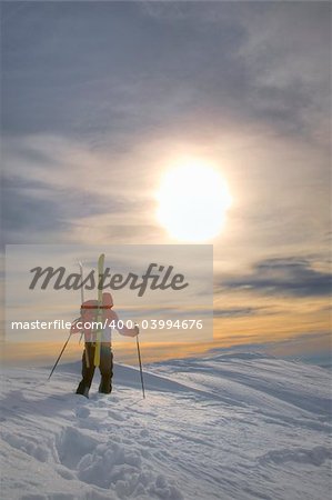 Winter mountaineering in wilderness area: male climber, exploring and adventure concept.