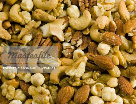 Various shelled mixed nuts background Image.