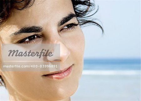 Outdoor portrait of a woman on the beach