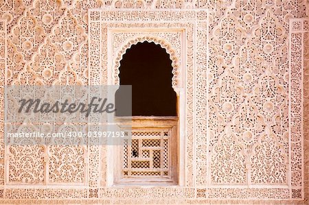 Window and arabian ornament. Detail of wall.