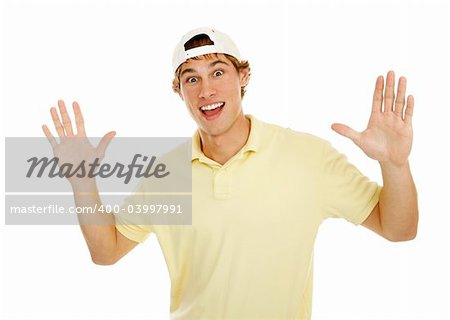 Young college age man throws up his hands in surprise.  Isolated on white.