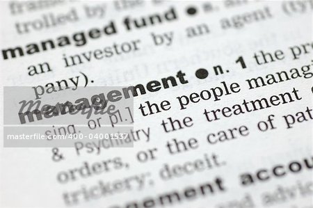 A close up of the word management from a dictionary