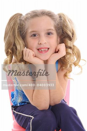 happy little girl with curly pig tails