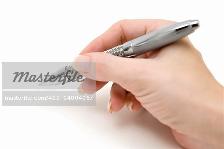 Woman holding a ball pen. Shallow depth of field. White background.