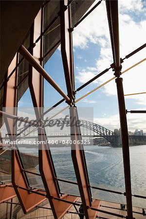 View through windows to Sydney Harbour Bridge in Australia.