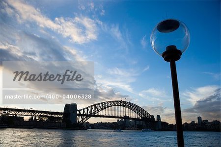 Sydney Harbour, Australia, with view of Sydney Harbour bridge and lamppost.