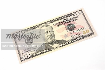 fifty dollar bill over a white surface