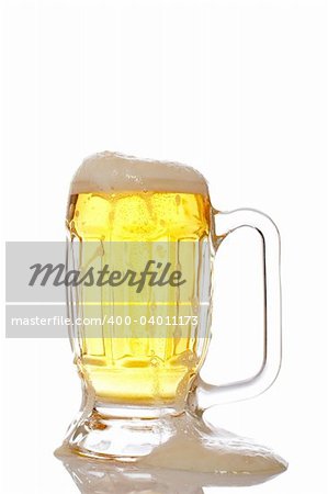 A mug of beer overflowing, reflected on white background