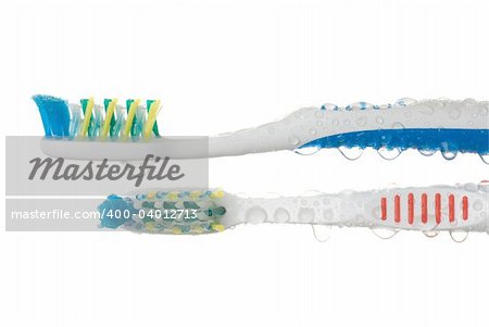 Two different toothbrushes on the white background