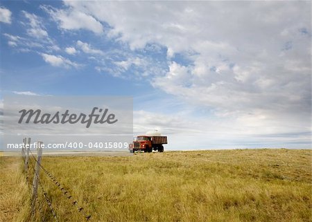 A water truck on the prairie