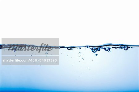 An abstract background of calm water with a few bubbles