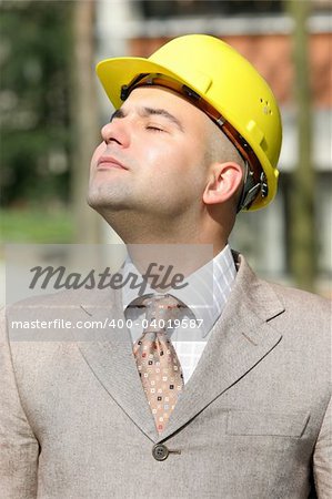 Businessman with helmet dream