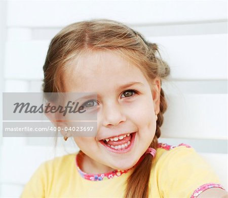 Cute kid laughing sincerely