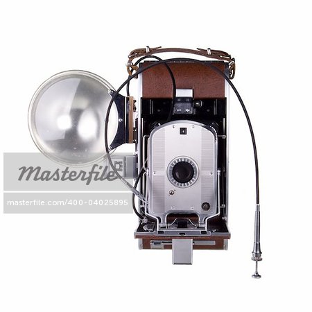 Vintage instant film camera with flash and cable release