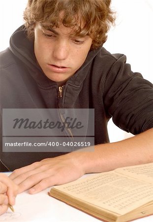 teenager doing homework isolated on white background