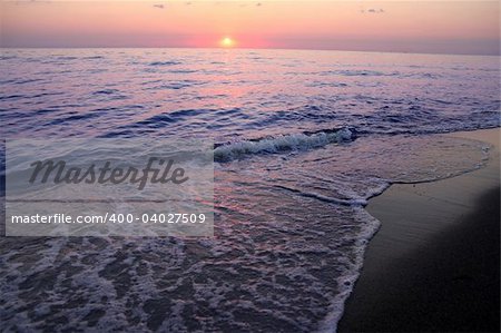 details of ocean and sunrise in Greece