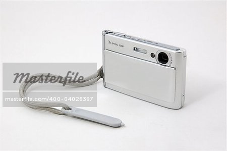 Small digital camera isolated on the white background