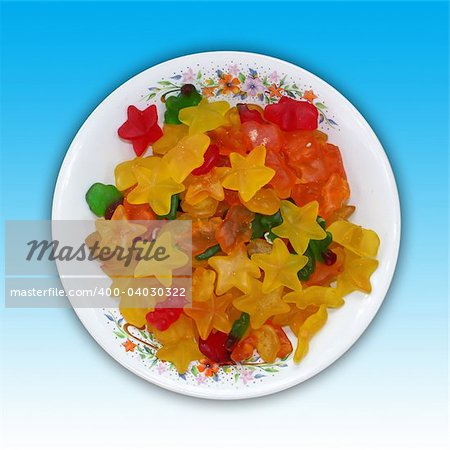 A plate of star and bear shaped jelly candies. Including clipping path.