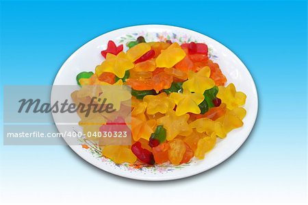 A plate of star and bear shaped jelly candies. Including clipping path.