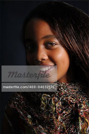 Portrait of young latina woman with a smile