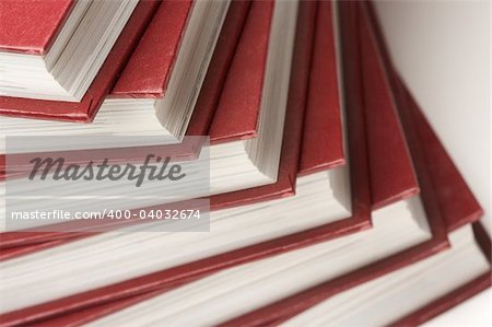 Burgundy Covered Stack of Books Close Up.