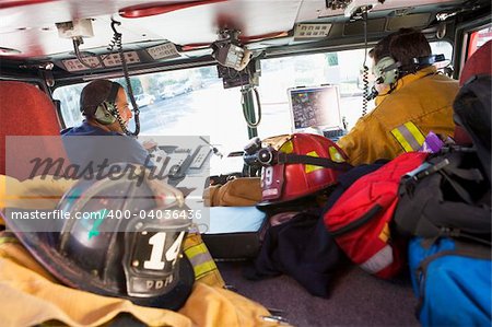 Firefighters travelling to an emergency